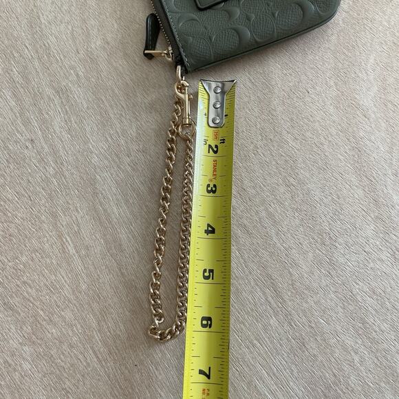 Coach Signature Embossed Leather Wristlet - Picture 16 of 16